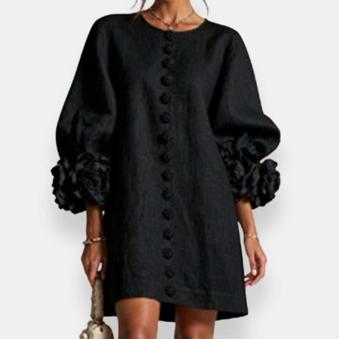 The elegant balloon sleeves of the brown embossed floral dress, adding a touch of volume and sophisticated charm.