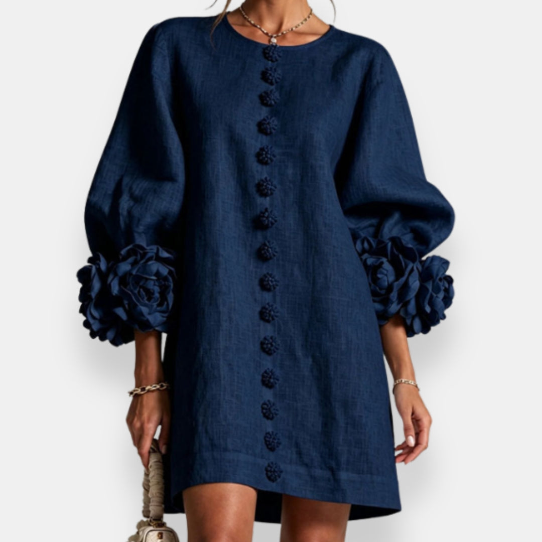 Full-length view of the green embossed floral dress, highlighting its versatile style suitable for various occasions.