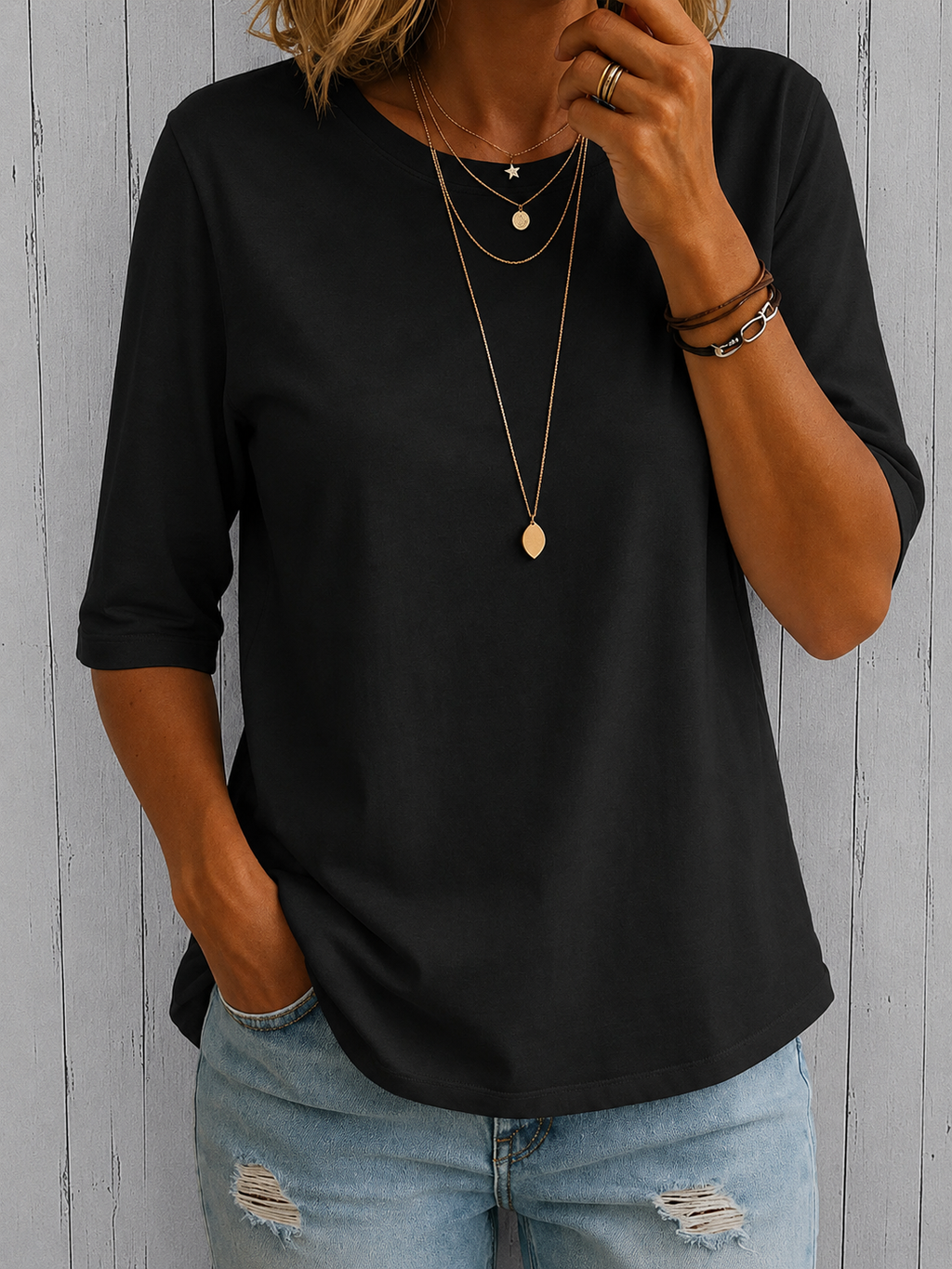 Back view showcasing the relaxed silhouette and comfortable drape of the everyday t-shirt.