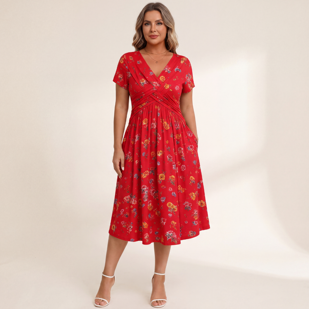 Rear view of the floral twist dress, showing the gentle drape of the breathable fabric and the relaxed fit.