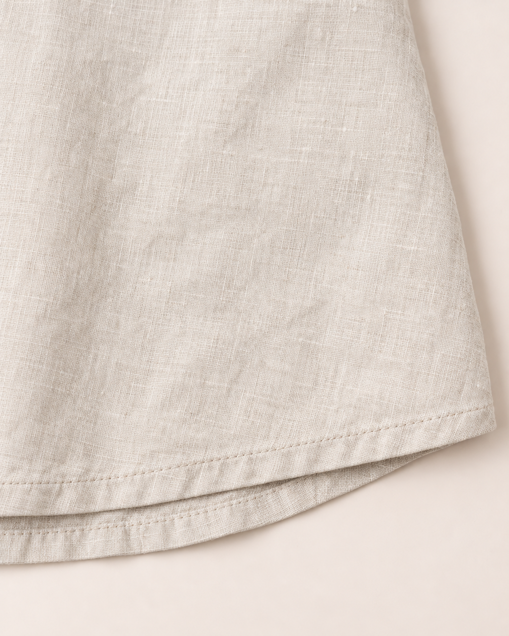Amelia Light Linen Blouse - detail of the fabric and hem, Beige