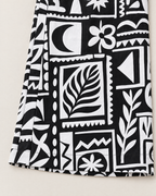 Astrid High-Waisted Wide Leg Trousers - detail of the fabric and hem, Black Print