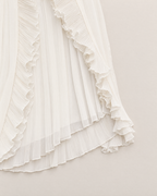 Cassia Chic Pleated Halter Midi Dress - detail of the fabric and side edge, White