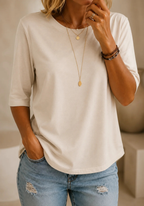 The versatile matcha green t-shirt laid flat, showcasing its simple yet elegant design.