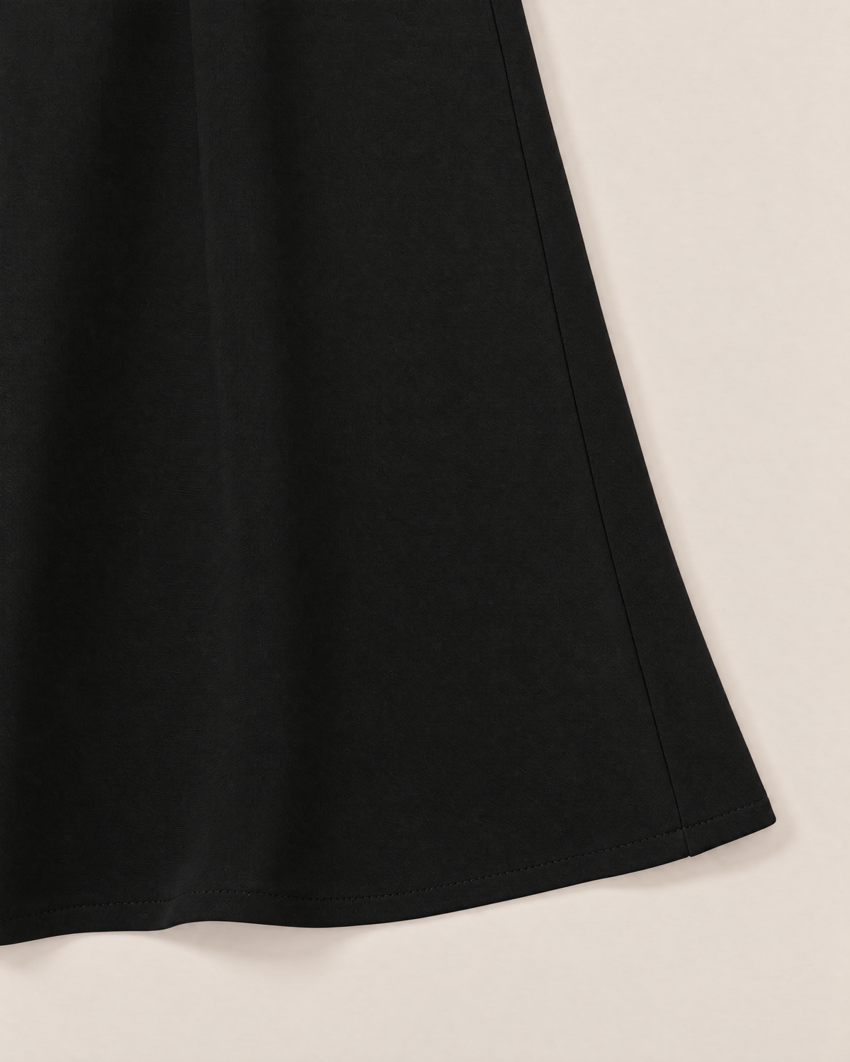 Eliza Chic Colorblock Midi Dress - detail of the fabric and side edge, Black
