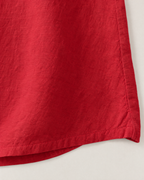 Elodie Relaxed Cotton-Linen Blouse - detail of the fabric and hem, Cherry Red