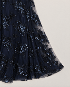 Elowen Sparkling Maxi Dress - detail of the fabric and side edge, Navy