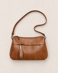 Genevieve Organized Everyday Crossbody Bag - Brown flat lay, top zip, zipped front pocket with a long pull tab, clasp on strap
