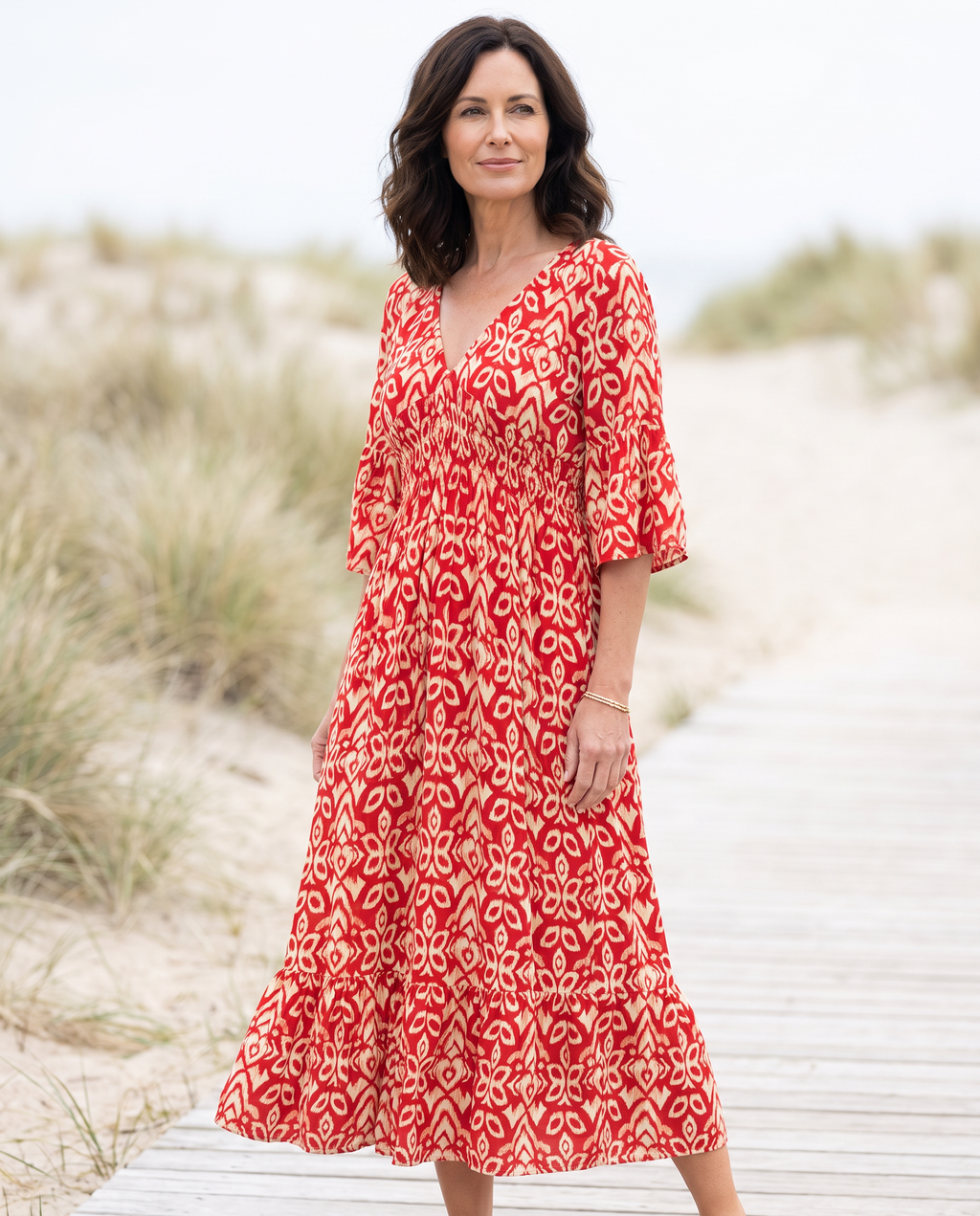 Selene Bohemian Midi Dress worn by a woman, Adeline Wear