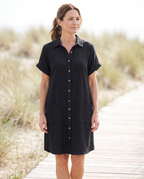 Kelsey Button Up Pocket Mini Shirt Dress worn by a woman, Adeline Wear