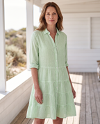 Kiana Breezy Striped Dress worn by a woman, Adeline Wear