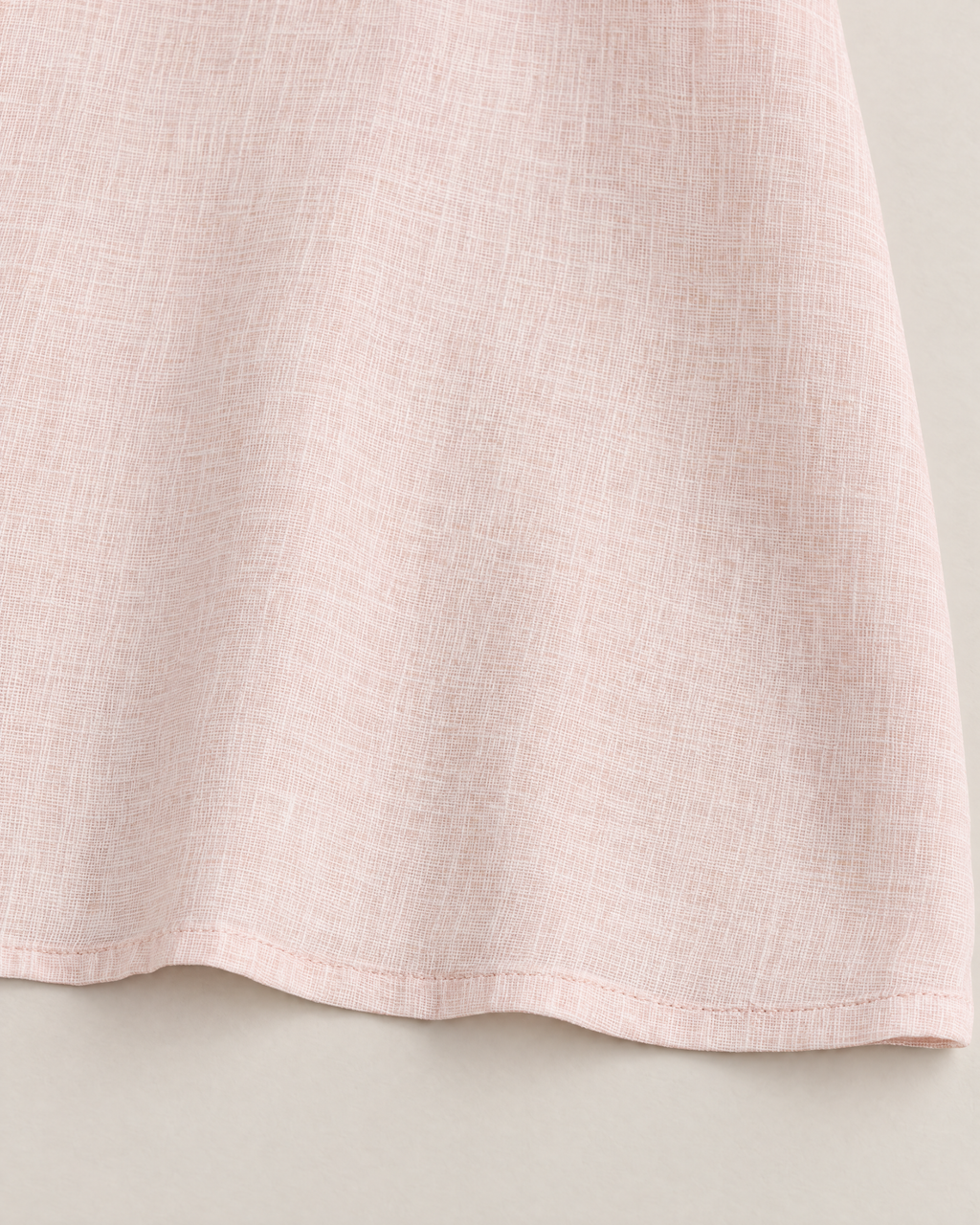 Kaia Elegant Linen-Blend Blouse - detail of the fabric and hem, Blush