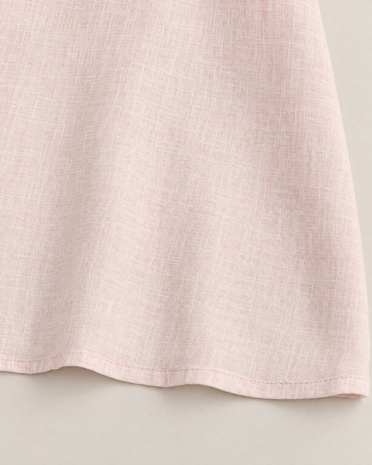 Kaia Elegant Linen-Blend Blouse - detail of the fabric and hem, Blush