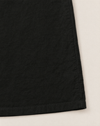 Leilani Relaxed Button-Front Summer Dress - detail of the fabric and side edge, Black