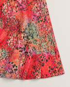 Mila Elegant Midi Dress - detail of the fabric and side edge, Red