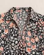 Thalia Lightweight Floral Midi Dress - detail of the soft shirt collar and V neckline, Black