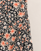 Thalia Lightweight Floral Midi Dress - detail of the lightweight woven fabric at the side seam, Black