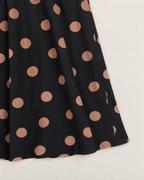 Zola Flattering Midi Dress - detail of the fabric and side edge, Black Spot