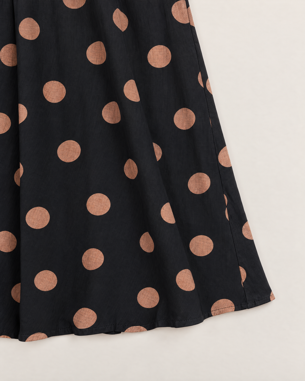 Zola Flattering Midi Dress - detail of the fabric and side edge, Black Spot